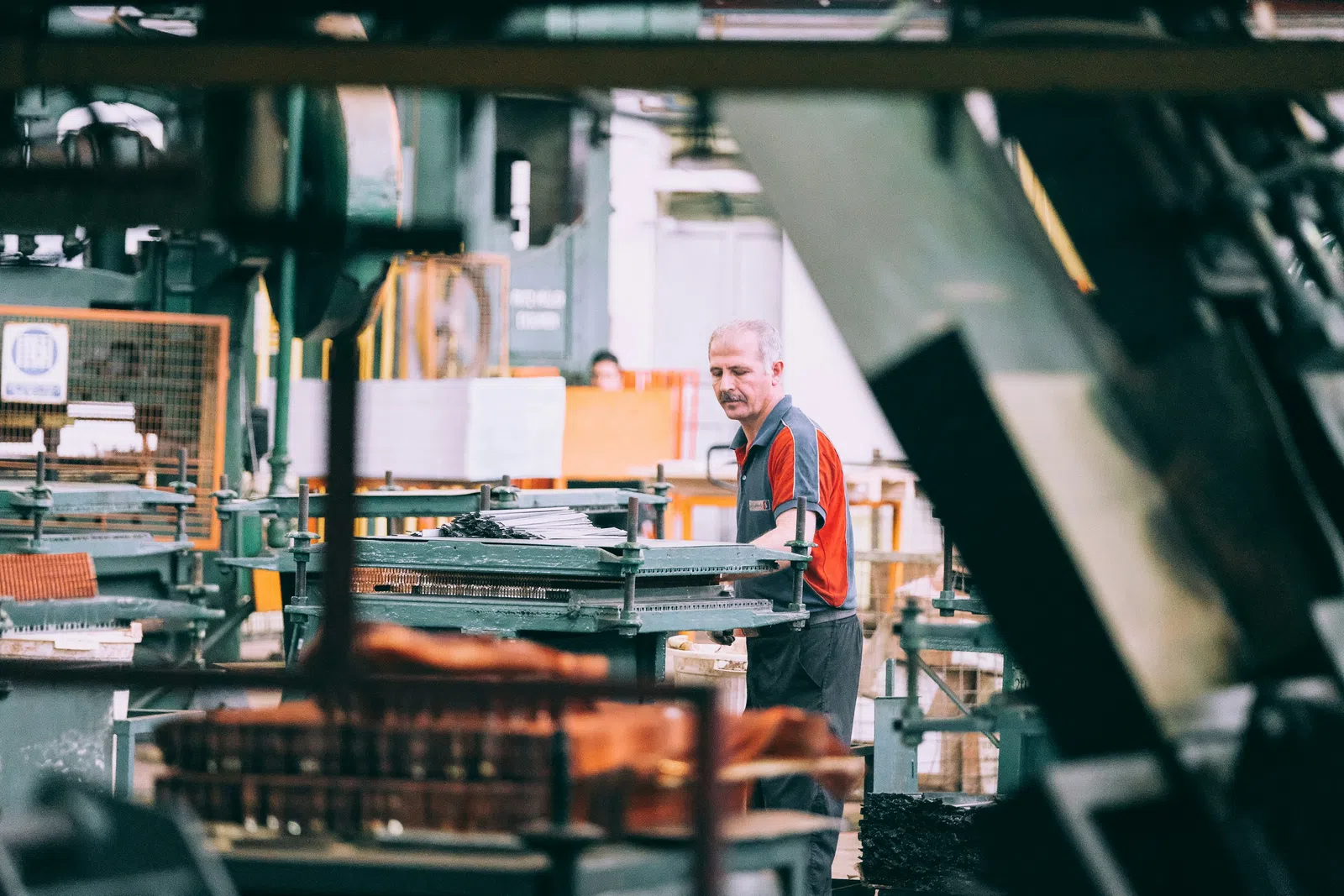 a man standing in a factory
