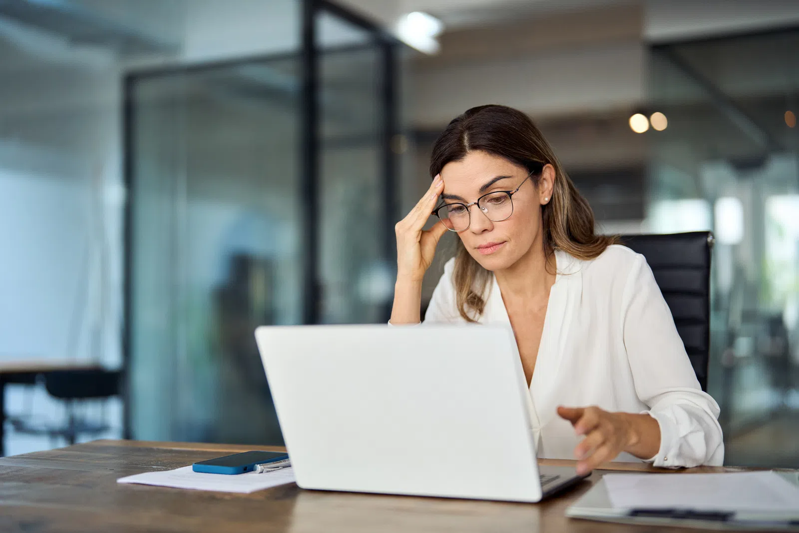 a woman working on her laptop