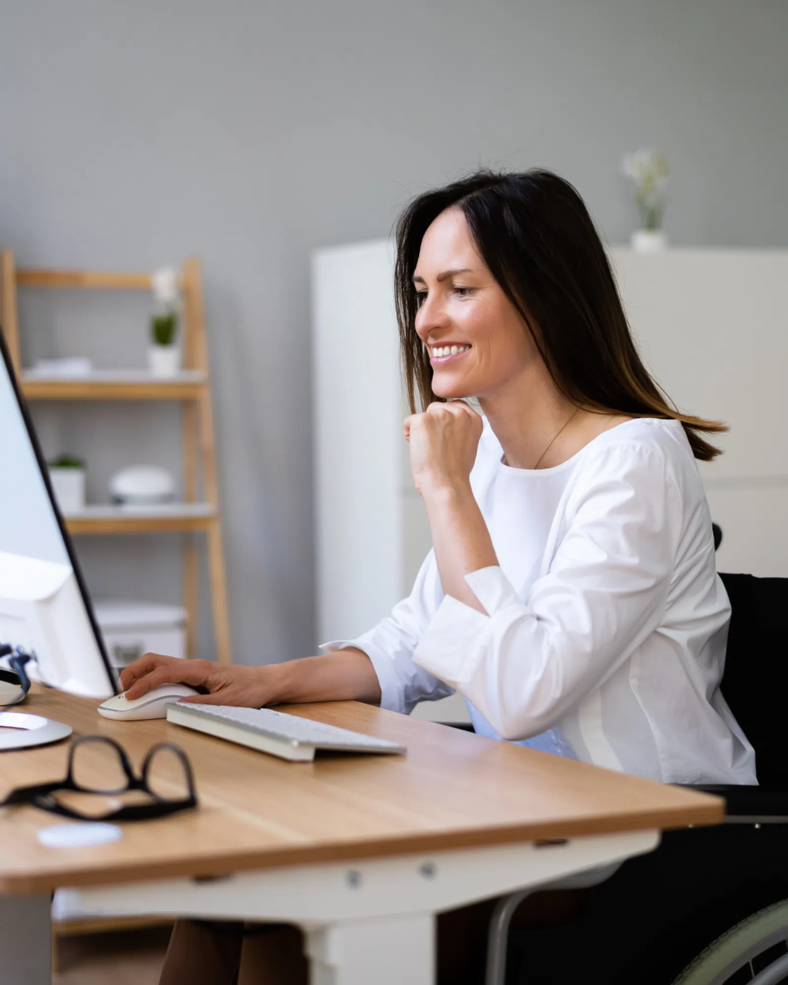 a woman sitting at a desk