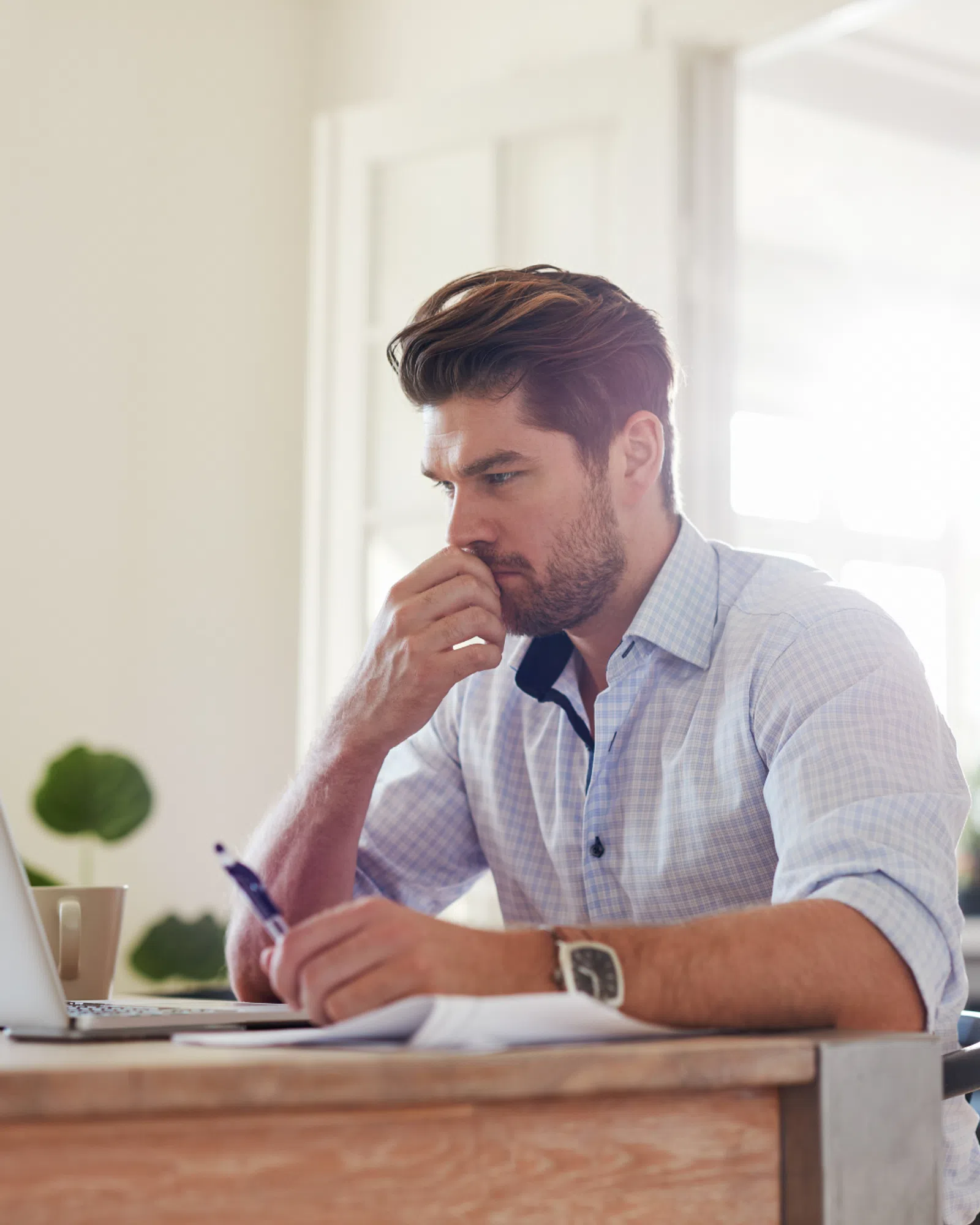 a man sitting at a desk